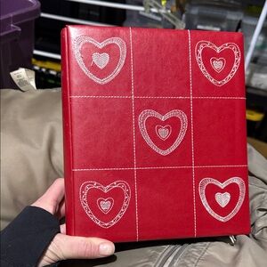 Red faux leather photo album